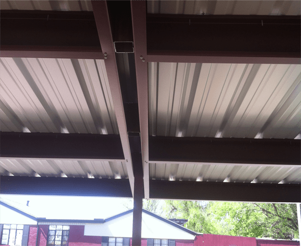 Picture of roof framing and roof panel for a steel carport built in Oklahoma City